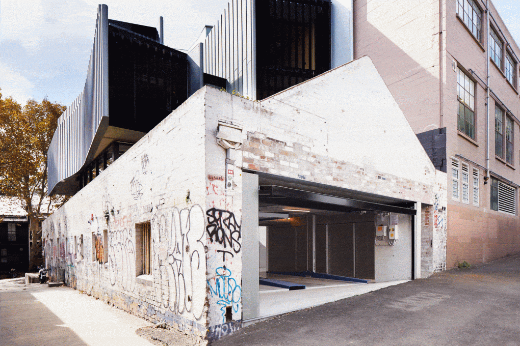 custom designed single panel garage door open in a Surry Hills warehouse conversion
