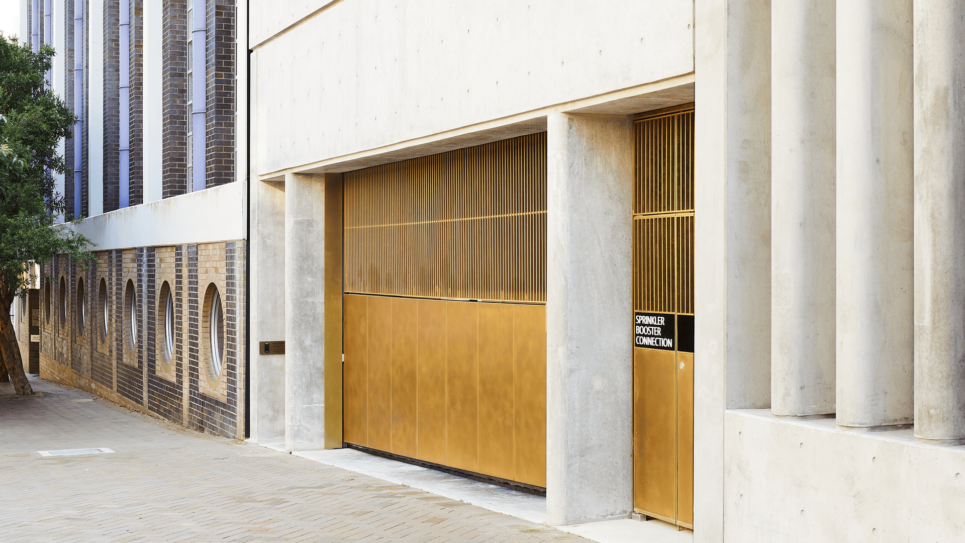 Custom Brass garage door in Surry Hills in Sydney.