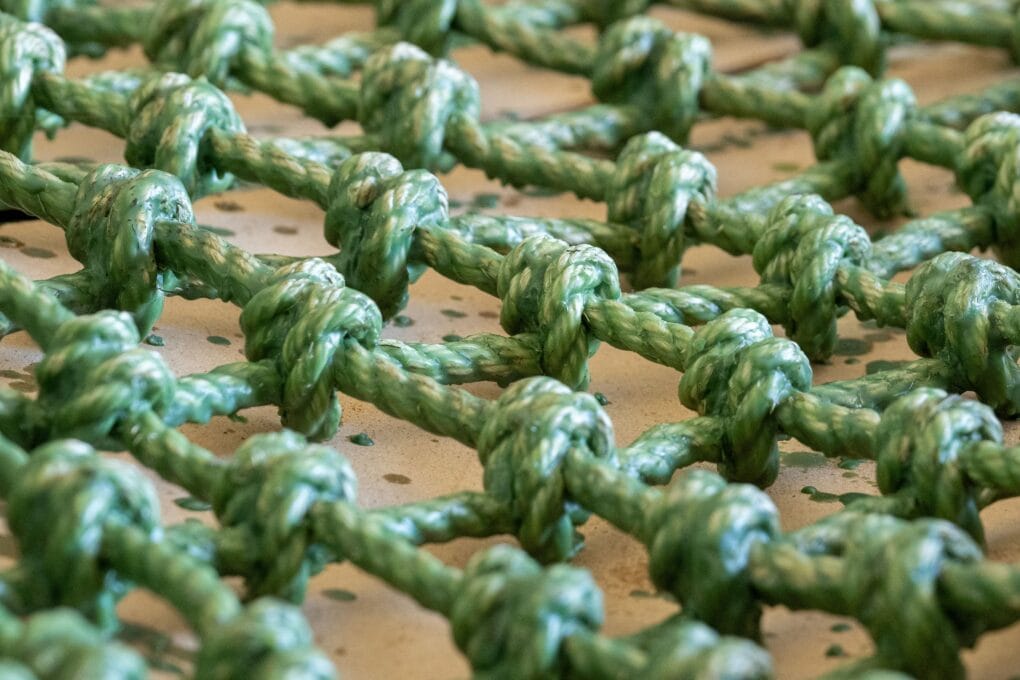 The net dipped in wax for Birrang Narrami artwork for the Sydney Fish Market