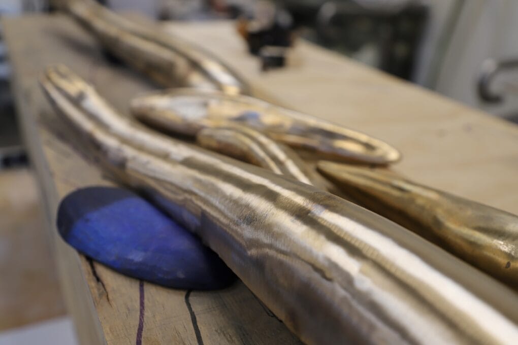 Bronze eels from The Call of Ngura (Country) artwork by Leanne Tobin for the Sydney Fish Market.