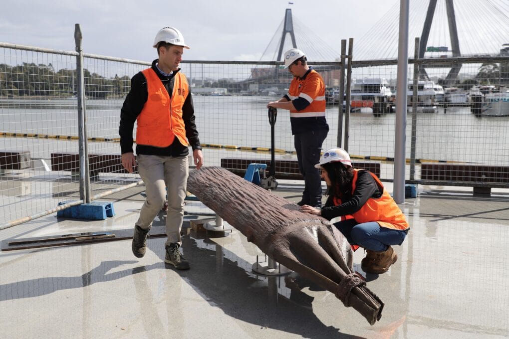 Tilt Industrial Design team installing The Nawi artwork at the Sydney Fish Market.