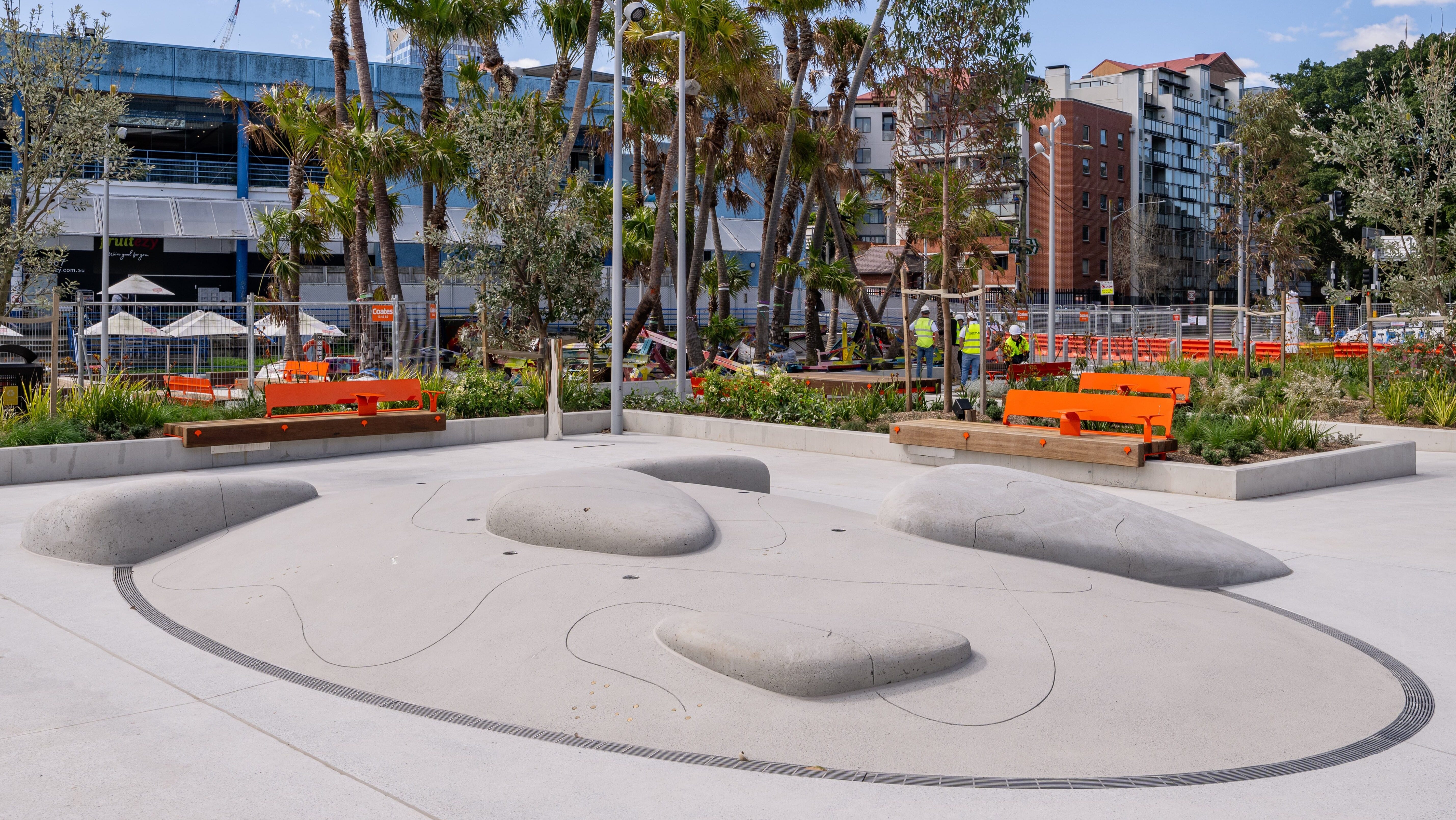Alison Page's 'Land of the Giant Pippies' artwork and waterplay at the Sydney Fish Market
